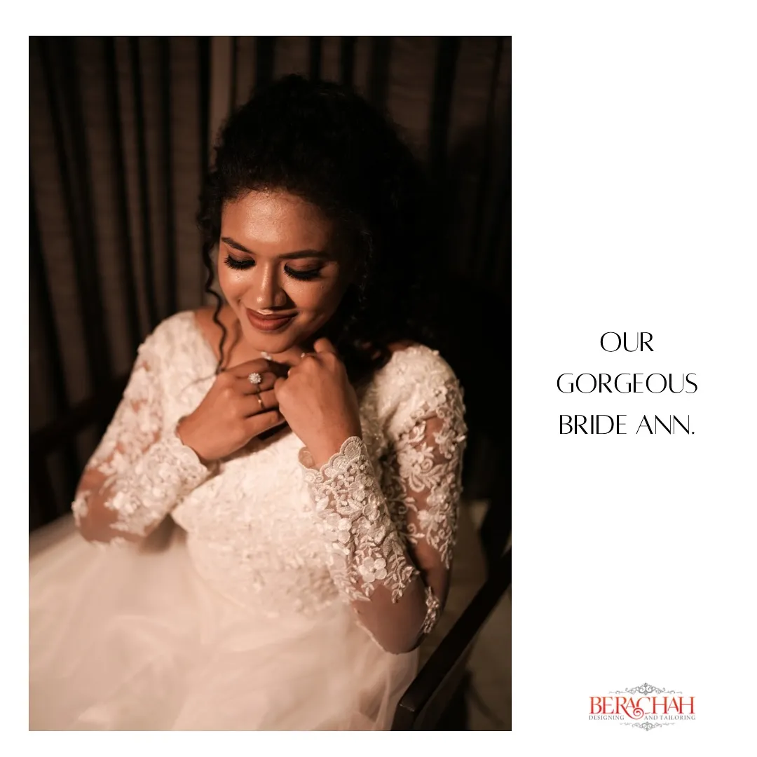 Bride in a white lace-sleeve ball gown, warm portrait