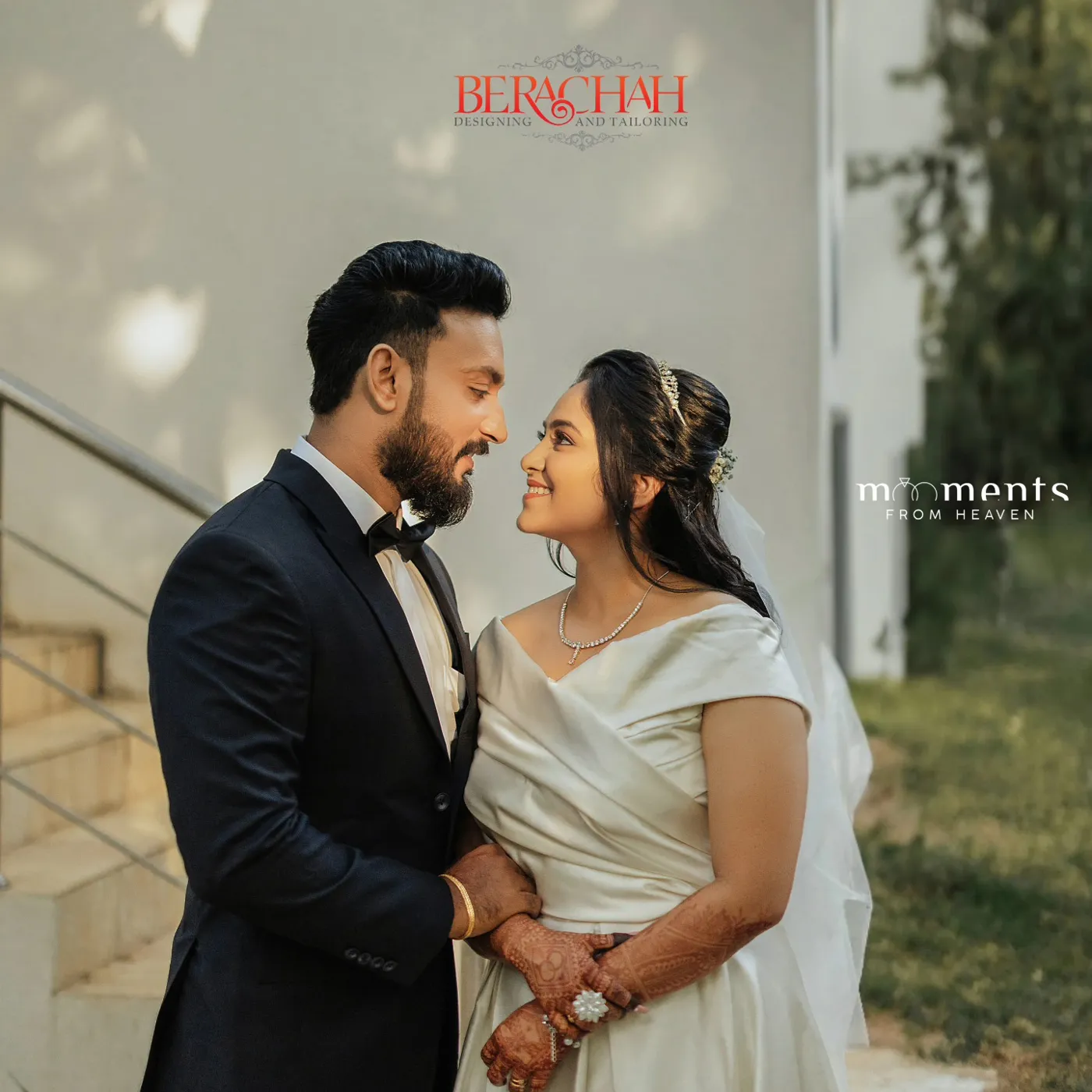 Bride in an off-shoulder ivory satin gown with groom